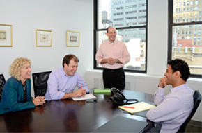 Training-workshops around conference table